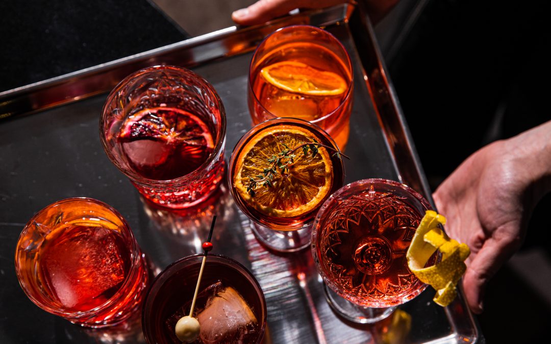 A Spotlight on The Negroni: QT Serves Bitter & Twisted Takes For The Month of September